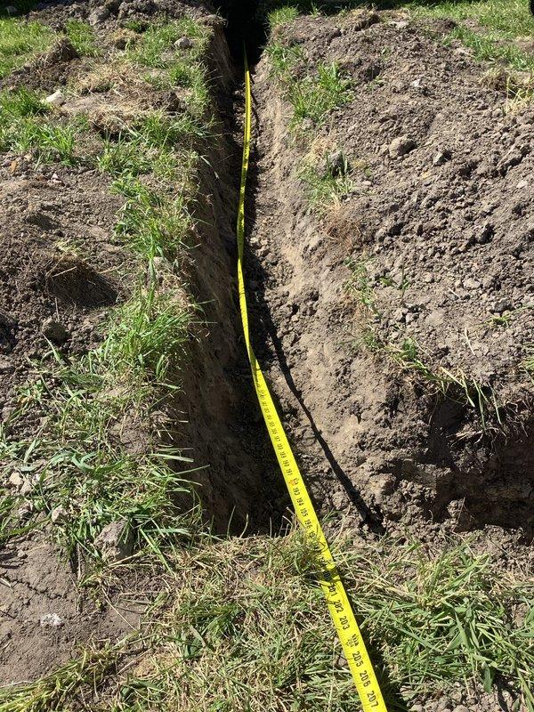 Installed sub-panel to provide dedicated electrical service for HVAC system. Trenched underground conduit run from main service to new panel location, mounted exterior disconnect box on building foundation, and completed all necessary wiring connections. All work performed to code specifications with proper grounding and circuit protection in place.