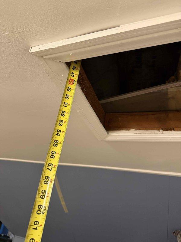 Performed comprehensive measurements of existing attic ductwork system to prepare accurate estimate for ductwork modifications or replacement. Accessed attic space through interior ceiling hatch, documented vertical clearances and opening dimensions, and photographed existing conditions to support proposal development for previously quoted HVAC system installation.