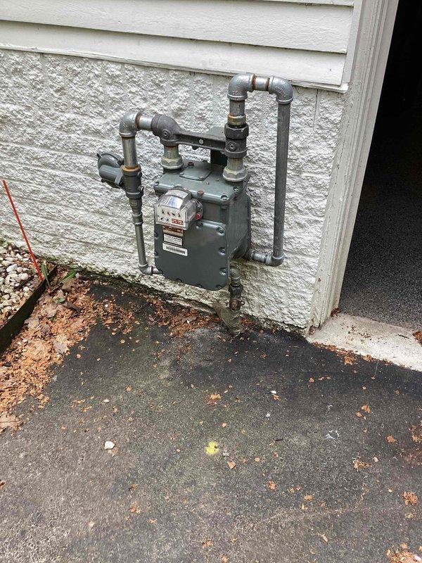 Performed initial startup and commissioning on recently installed 20kW Kohler generator unit. Verified natural gas line connections and meter installation for proper supply to generator. Accessed interior electrical panel to confirm proper integration with home electrical system. Programmed and initiated weekly automatic exercise cycle that had not been previously configured post-installation. Tested generator operation and verified successful transition between utility and generator power sources.