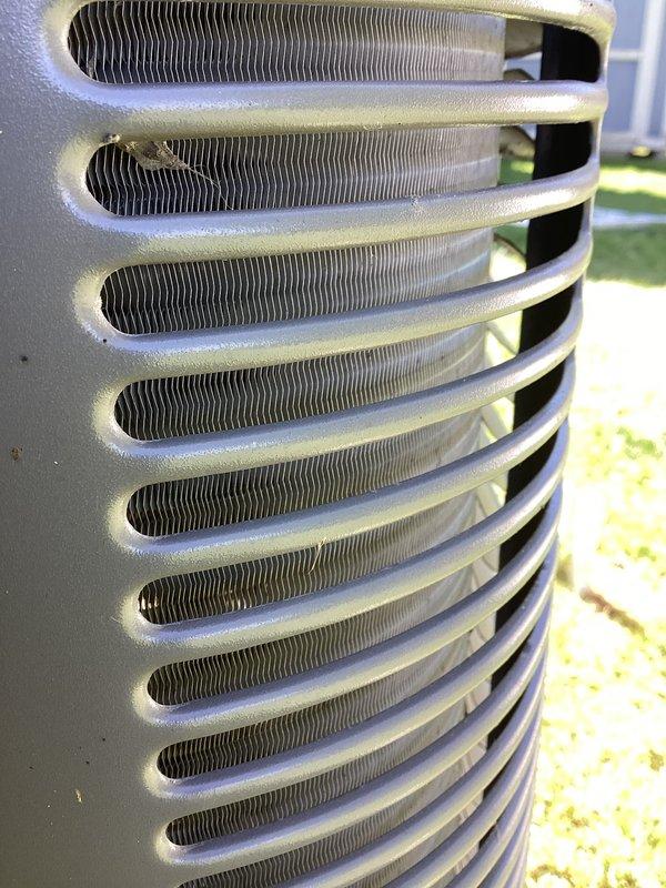 Completed annual preventive maintenance on Lennox outdoor condensing unit. Inspected condenser coil, fan operation, and overall unit condition. Noted filter replacement required and documented equipment status with photographs for service records.