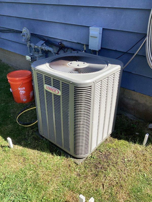 Completed annual preventive maintenance on Lennox outdoor condensing unit. Inspected condenser coil, fan operation, and overall unit condition. Noted filter replacement required and documented equipment status with photographs for service records.