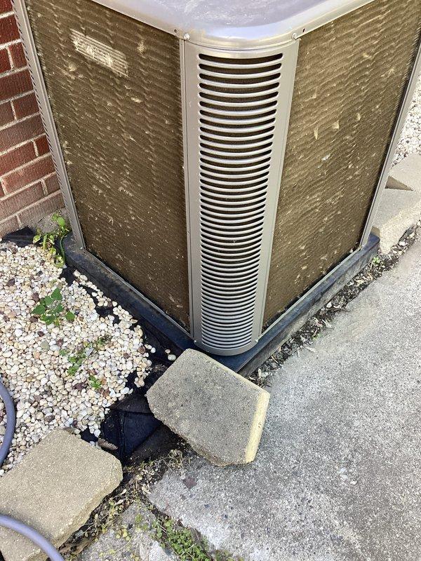 Completed routine Air Care Maintenance on residential air conditioning system. Performed comprehensive inspection of outdoor condenser unit, verifying proper operation and airflow through louvered panels and fan assembly. Advised customer that air filter requires replacement to maintain optimal system efficiency and indoor air quality.