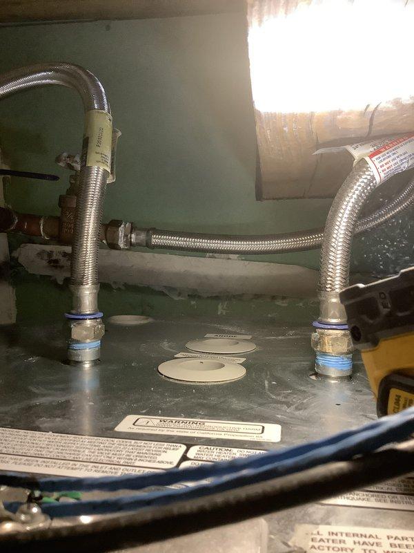Successfully installed a 50-gallon Bradford White tanked water heater in the rear yard utility enclosure. Completed all necessary plumbing connections using braided stainless steel flex lines with compression fittings, established proper electrical connections, and ensured compliance with mechanical permit requirements. Unit was tested for proper operation and all safety labels were verified in place.
