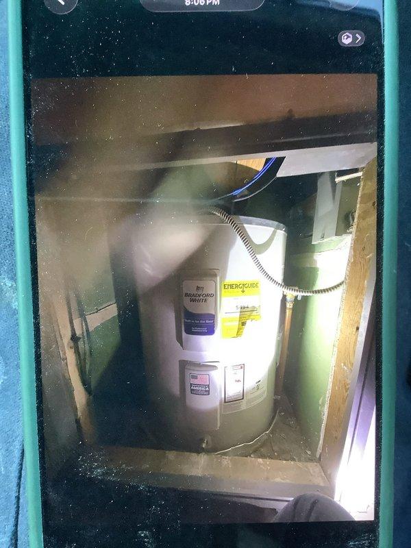 Successfully installed a 50-gallon Bradford White tanked water heater in the rear yard utility enclosure. Completed all necessary plumbing connections using braided stainless steel flex lines with compression fittings, established proper electrical connections, and ensured compliance with mechanical permit requirements. Unit was tested for proper operation and all safety labels were verified in place.