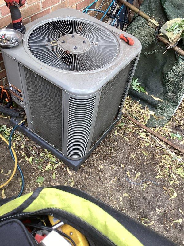 Completed annual preventative maintenance on residential air conditioning system. Connected refrigerant gauges to service ports, verified system pressures and temperatures, inspected condenser unit operation including fan motor and compressor function. Cleaned condenser coil, checked electrical connections, and confirmed proper airflow through unit. System operating within normal parameters with no deficiencies noted.