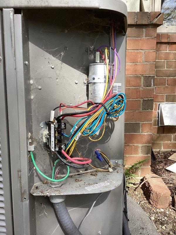 Performed annual cooling maintenance on Lennox HVAC system. Upon arrival, contacted customer as requested before beginning work. Inspected outdoor condensing unit and found evaporator coil heavily contaminated with dirt and debris accumulation. Cleaned coil thoroughly to restore proper airflow and system efficiency. Inspected electrical panel and internal wiring connections, verified capacitor condition, and checked contactor operation. Replaced air filter. Documented system condition with photographs showing before condition of soiled coil and electrical components. All components tested and operating within normal parameters upon completion.