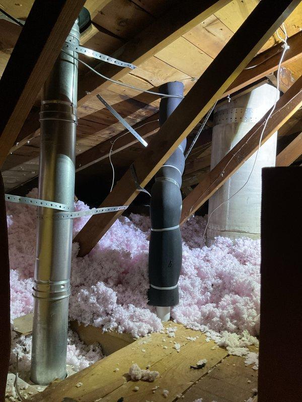 Completed full HVAC system installation including a 70,000 BTU furnace and 2-ton air conditioning unit with rear discharge configuration. Installed new ductwork in attic space with proper insulation coverage, routed supply and return ducts through existing structure, and added PVC vent pipe through roof with weatherproof flashing. All mechanical and electrical connections completed, system tested and operational.