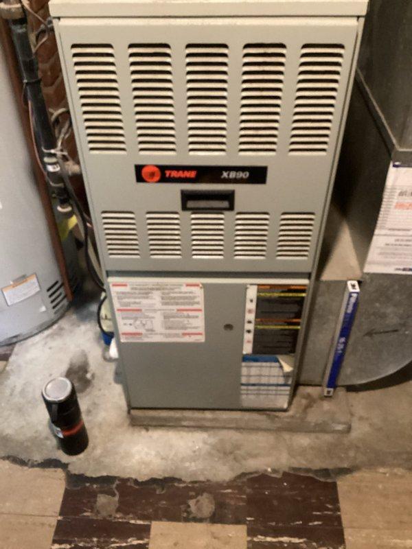 Completed annual HVAC maintenance on system consisting of Trane XB80 furnace and outdoor R-407C condensing unit. Performed comprehensive inspection of both indoor and outdoor components, verified operational status of all equipment, and documented system condition with photographic records. No filter replacement required at this time.