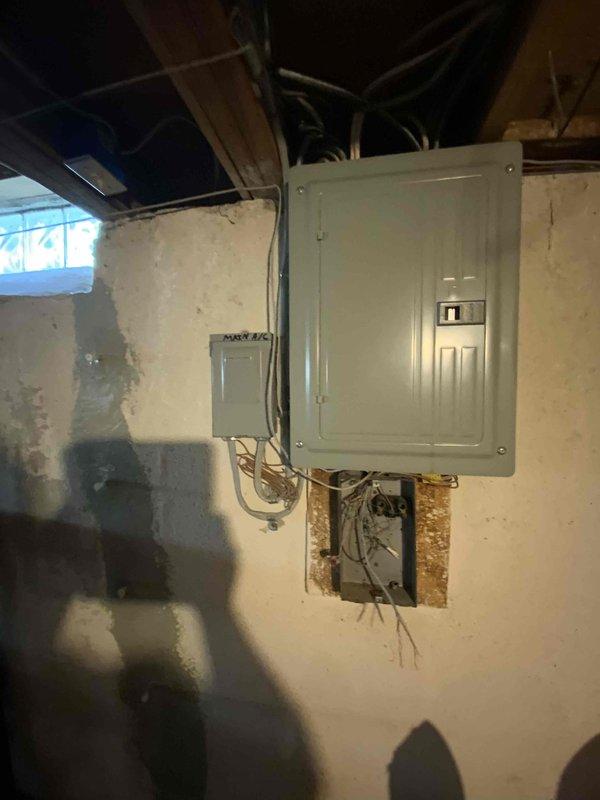 Conducted comprehensive full system estimate for 28-year-old Bryant central air conditioning unit that was deemed too costly to repair by home warranty service technician. Assessed existing HVAC infrastructure including exterior condenser location, electrical service connections, and interior furnace/air handler configuration in basement utility area. Documented current system conditions, electrical panel accessibility, and provided customer with replacement options for complete heating and cooling system due to unit failure and age-related inefficiency.