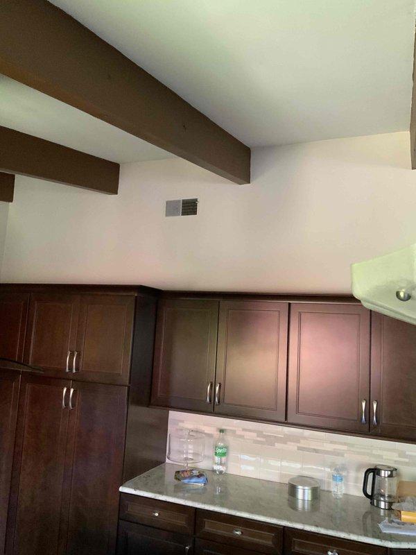 Completed estimate for brand new mini split installation at residential property with no existing equipment present. Evaluated attic space for indoor air handler placement and assessed kitchen area with vaulted ceiling for potential indoor unit location, documenting existing HVAC ductwork, insulation conditions, and available mounting surfaces to provide customer with installation options and pricing for expedited service request.