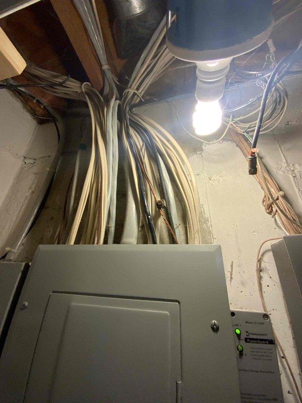 Completed comprehensive HVAC estimate for air conditioning replacement at a 30-year-old colonial home with forced air natural gas heating system and basement installation. Evaluated existing mechanical room configuration including current furnace, ductwork distribution, electrical panel capacity, and available space for new equipment installation, presenting options for both standalone A/C replacement and whole home comfort package upgrade.