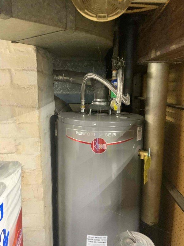 Provided estimate for replacement of 76-year-old furnace and non-operational air conditioning system located in basement. Assessed existing HVAC equipment, ductwork configuration, and utility connections including water heater proximity and available space for new installation. Documented current system conditions and mechanical room layout to prepare comprehensive replacement proposal for both heating and cooling units.
