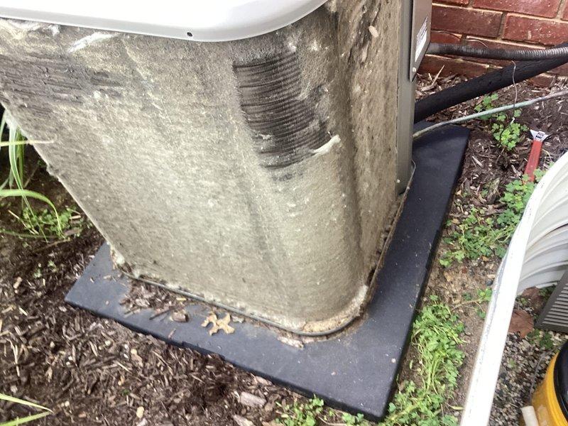 Responded to service call for residential A/C unit producing loud squeaking noises and experiencing reduced cooling efficiency. Upon arrival, found outdoor condenser unit heavily coated with dirt, debris, and grime on exterior casing and coil surfaces. Unit showed signs of extended outdoor exposure with significant accumulation of dust, leaves, and organic matter. Vegetation and weeds had grown in close proximity to equipment, restricting airflow around the unit.

Performed thorough inspection of condenser unit and identified excessive buildup on condenser coils as primary cause of reduced cooling capacity and increased operating noise. Cleaned condenser coils using appropriate cleaning solution and pressure washing techniques to remove accumulated debris. Cleared vegetation and organic matter from around unit perimeter to restore proper airflow clearance. Inspected fan motor and blower assembly for mechanical issues contributing to squeaking noise. Lubricated fan motor bearings and ve