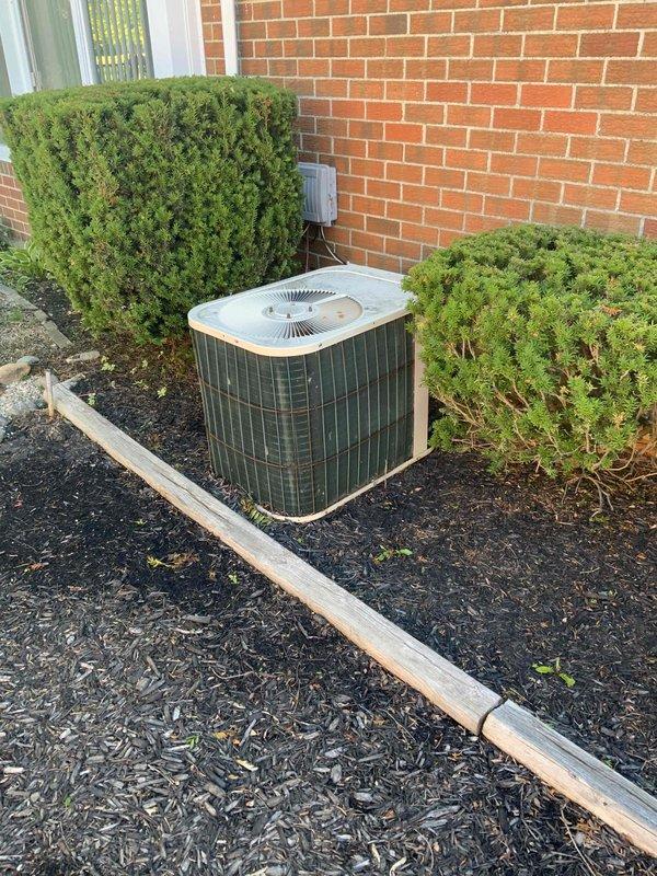Completed comprehensive whole home comfort system evaluation for non-operational air conditioning unit and aging furnace system. Assessed outdoor condenser unit positioned on exterior pad with proper clearances and landscaping, evaluated basement-installed forced air furnace with existing ductwork infrastructure, and provided detailed estimate for complete HVAC system replacement including new high-efficiency equipment specifications and installation requirements.