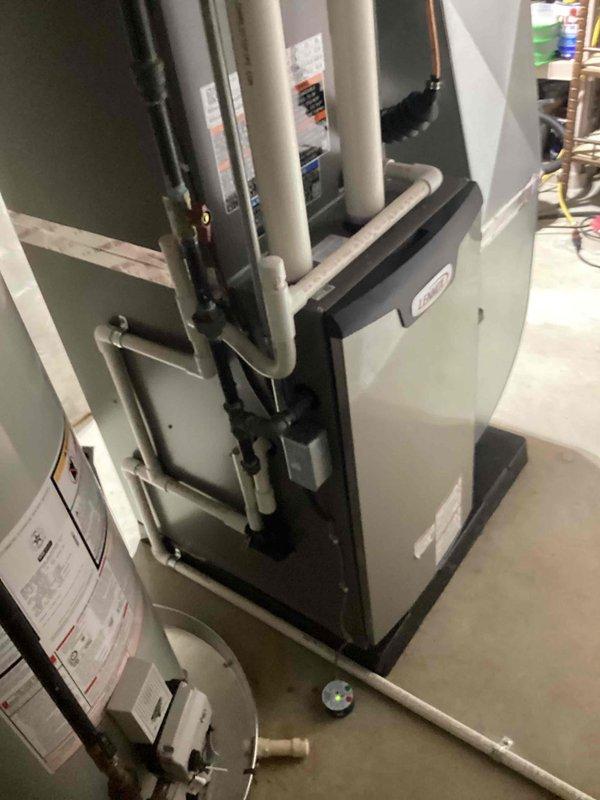 Completed full HVAC system installation including a 70,000 BTU furnace, 2.5-ton air conditioning unit with matching evaporator coil configured for right-side placement. Performed all mechanical and electrical connections, installed proper PVC condensate drainage and venting systems, and reconnected all necessary utilities to ensure proper system operation.
