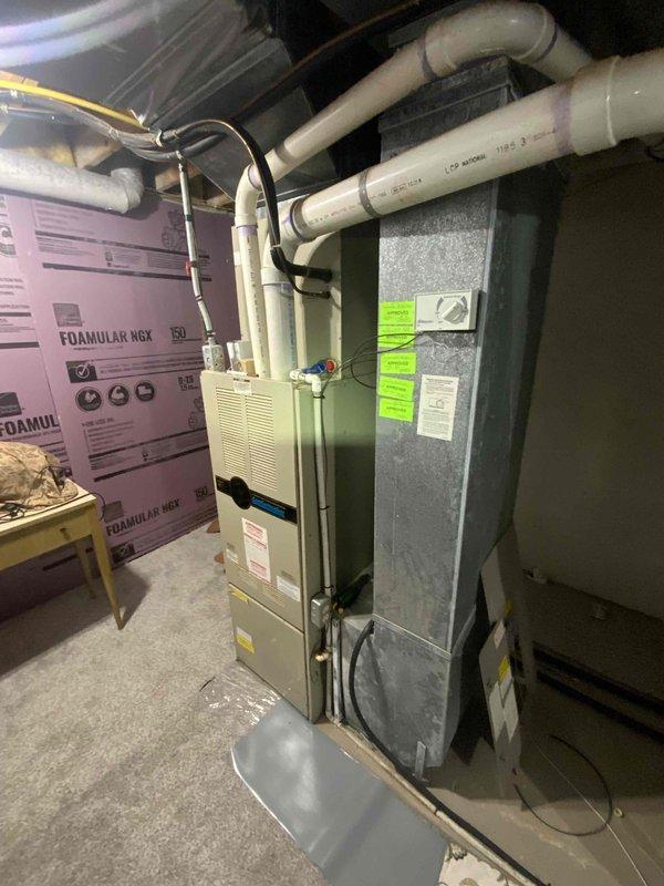Conducted replacement estimate for 32-year-old furnace and air conditioning systems serving whole house. Inspected existing equipment located in basement mechanical room, documented current HVAC infrastructure including ductwork, venting, and electrical connections. Provided pricing options for new 2-ton and 3-ton Lennox system installations to replace aging 1994 units, with customer requesting expedited replacement timeline.