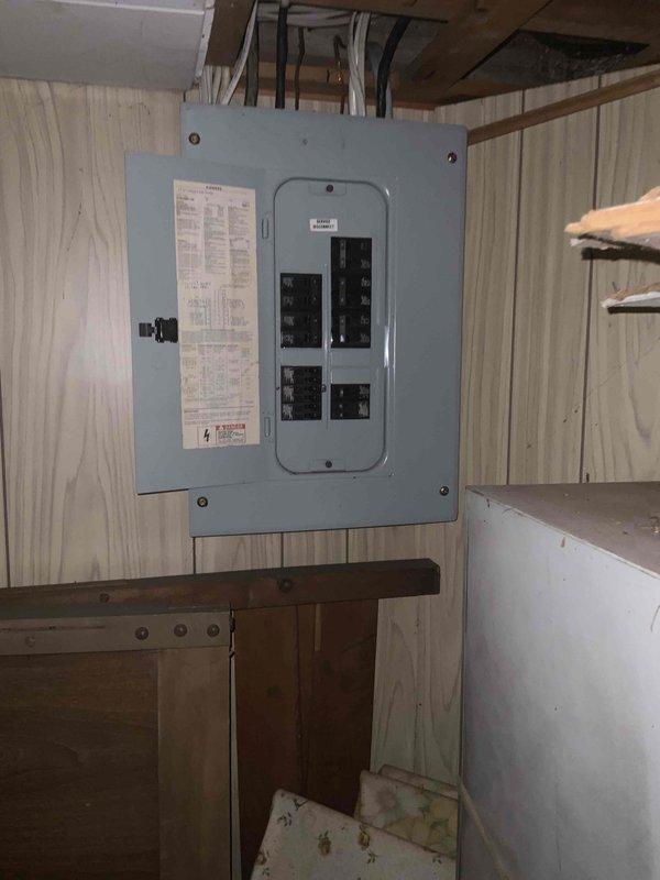 Conducted a comprehensive full system estimate for a 16-year-old residential air conditioning system. Evaluated existing HVAC equipment located in the basement utility area, including the furnace unit with associated PVC venting, flexible ductwork, and electrical connections. Documented current system configuration through photographic assessment, noting equipment age and operational status indicators. Reviewed electrical panel capacity and existing infrastructure to determine compatibility requirements for potential system replacement. Customer indicated need for replacement within the next couple of weeks.