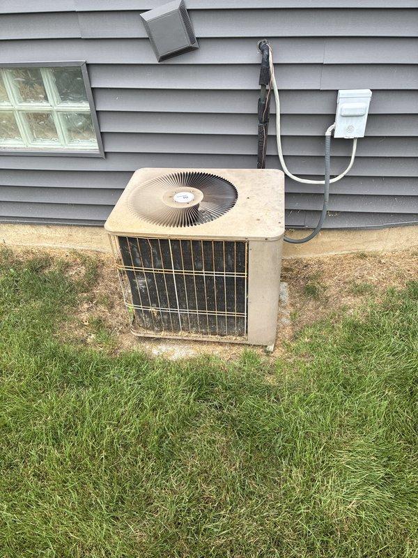 Provided estimate for complete HVAC system replacement including air conditioning unit and furnace for 25-year-old equipment with diminished performance. Current outdoor condenser unit shows significant weathering and age-related deterioration, while basement-installed furnace and ductwork require replacement to restore proper system functionality and efficiency.