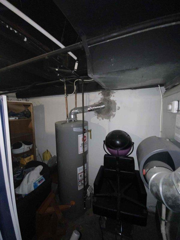 Provided estimate for complete air conditioning system replacement in basement location. Current 15+ year old unit is non-operational and requires full system replacement including outdoor condenser, indoor evaporator coil, and associated refrigerant lines and electrical connections.