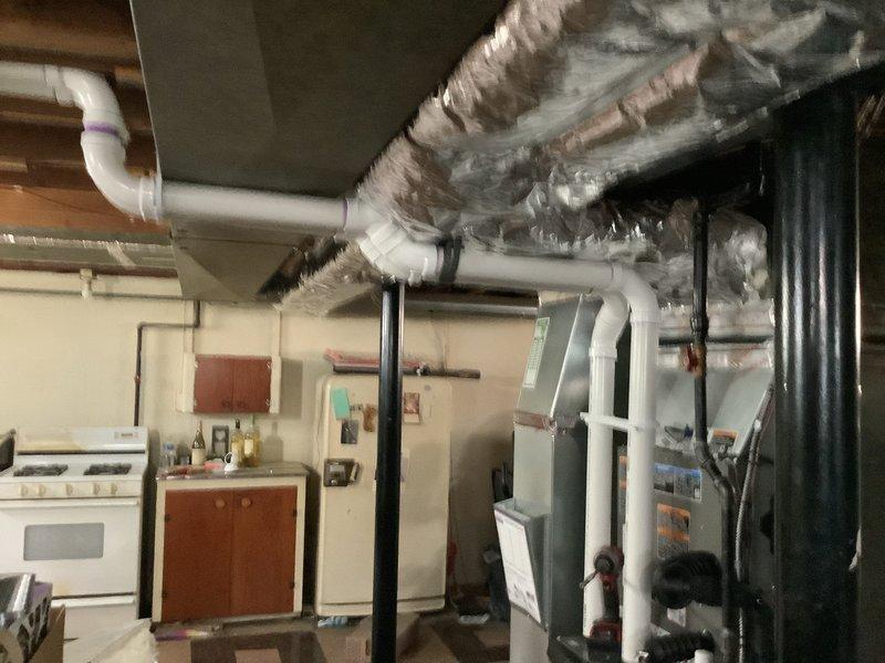 Picked up insulation materials from shop and installed insulation on exposed supply ductwork in basement area. Applied flexible insulated wrapping to previously uninsulated metal ductwork runs extending from air handler unit across ceiling joists. Work completed under full warranty coverage with no charge to customer.