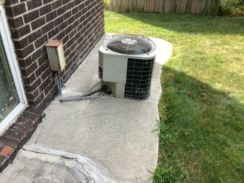 Responded to no-heat call on 49-year-old furnace installed in 1977. Upon arrival, unit was shut down due to rumbling sounds reported throughout the day with no heat or airflow to home. Conducted thorough inspection of basement-mounted furnace and found system had reached end of serviceable life with multiple mechanical failures. Unit had history of frequent breakdowns during previous heating season and was previously flagged for replacement. Heat exchanger showed signs of severe deterioration consistent with age, and blower assembly exhibited excessive wear causing abnormal noise during operation. Thermostat malfunction also noted, as home temperature had recently climbed to 82°F despite 72°F setpoint, indicating failed heating/cooling control. Given the age of equipment, extent of mechanical degradation, safety concerns with heat exchanger integrity, and cost of necessary repairs versus replacement, recommended immediate system replacement. Provided customer with options for new high-