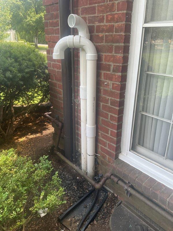 Completed callback to address municipal inspection violations and system malfunction following 4-ton AC and coil installation. Corrected buried refrigerant line set by raising, insulating with UV-protective jacketing, and installing proper support brackets per code requirements. Relocated fresh air intake duct to maintain minimum 36-inch vertical separation from furnace exhaust termination point. Applied electrical panel labels identifying circuit breaker assignment and equipment designation for code compliance.