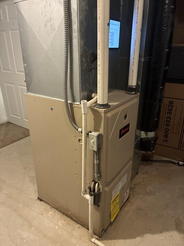 Responded to appointment for full HVAC system replacement estimate. Inspected existing 15-year-old Amana furnace, air conditioning system, and tankless water heater currently installed in basement utility space. All equipment operational at time of visit with no reported issues or symptoms. Documented existing system configuration including furnace unit with PVC venting, metal supply ductwork, and gas line connections. Photographed current installation showing equipment placement, venting arrangement, and overall system condition. Provided comprehensive replacement estimate for complete HVAC system upgrade including new furnace, air conditioner, and tankless water heater to accommodate expedited installation timeline.