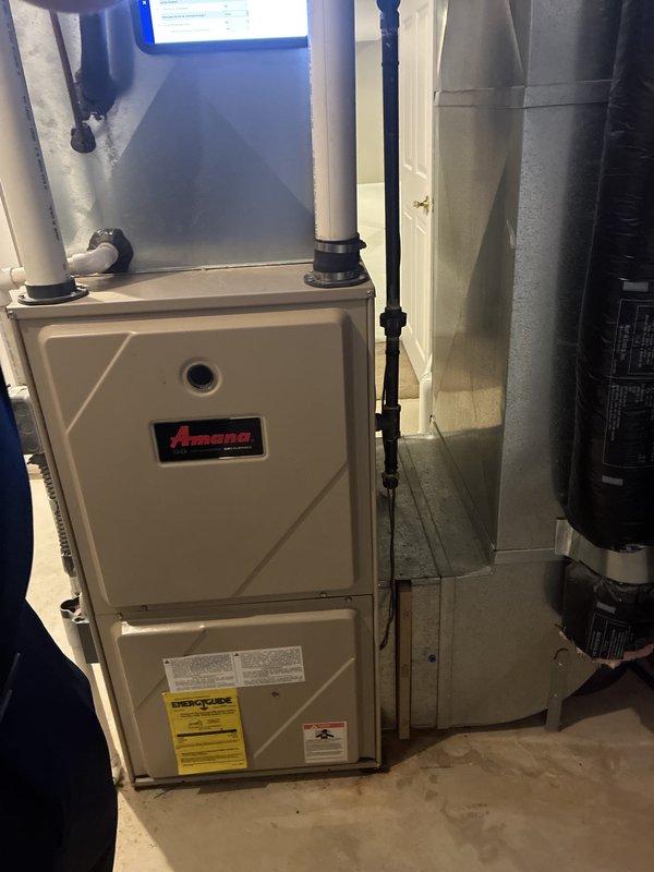 Responded to appointment for full HVAC system replacement estimate. Inspected existing 15-year-old Amana furnace, air conditioning system, and tankless water heater currently installed in basement utility space. All equipment operational at time of visit with no reported issues or symptoms. Documented existing system configuration including furnace unit with PVC venting, metal supply ductwork, and gas line connections. Photographed current installation showing equipment placement, venting arrangement, and overall system condition. Provided comprehensive replacement estimate for complete HVAC system upgrade including new furnace, air conditioner, and tankless water heater to accommodate expedited installation timeline.