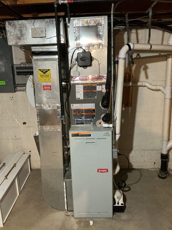 Completed installation of 2-ton air conditioning unit with matching evaporator coil on existing Bryant furnace system. All mechanical and electrical permits were obtained prior to installation, with proper right-side placement and reconnection of existing systems. Unit was installed per manufacturer specifications, refrigerant lines connected, electrical wiring completed, condensate drainage verified, and system tested for proper operation. Provided furnace filters as requested.