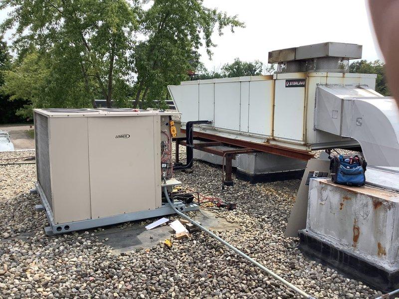 Responded to service call for non-operational rooftop unit that required specialized equipment not available during previous visit. Performed diagnostic assessment on Sterling-branded RTU located on commercial rooftop alongside multiple other HVAC units. Identified system failure, completed necessary repairs using appropriate tools and equipment, and restored unit to operational status.