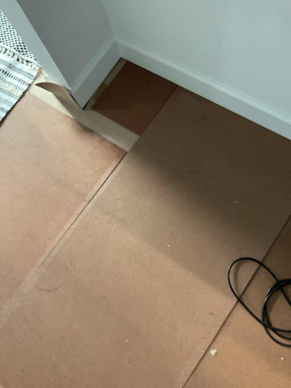 Completed warranty replacement of evaporator coil on existing HVAC system. Protected work area with cardboard floor covering to prevent damage during installation. Successfully replaced defective evaporator coil and reconnected all refrigerant lines, ensuring proper system operation and verifying no leaks in the refrigeration circuit.
