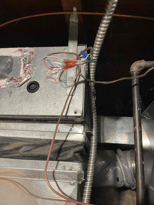 Responded to no cooling call on 3-year-old air conditioning system displaying error code 434 indicating inverter communication failure. Upon arrival, confirmed complete system shutdown and began diagnostic procedures to isolate the communication fault between outdoor unit inverter board and control system. Inspected all low-voltage wiring connections at terminal blocks, verifying proper wire terminations and checking for loose connections, corrosion, or damaged conductors that could interrupt communication signals. Examined control board connections and wiring harnesses for signs of moisture intrusion, physical damage, or manufacturing defects. Tested voltage and continuity across communication circuits to identify break in signal path. Documented existing wiring configuration and terminal connections with photos showing wire routing, terminal block arrangement, and connection points for warranty documentation purposes. Given the age of the unit still under manufacturer warranty, ident