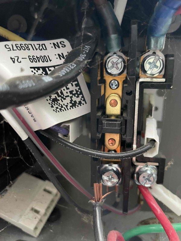 Responded to no cooling call on 3-year-old air conditioning system displaying error code 434 indicating inverter communication failure. Upon arrival, confirmed complete system shutdown and began diagnostic procedures to isolate the communication fault between outdoor unit inverter board and control system. Inspected all low-voltage wiring connections at terminal blocks, verifying proper wire terminations and checking for loose connections, corrosion, or damaged conductors that could interrupt communication signals. Examined control board connections and wiring harnesses for signs of moisture intrusion, physical damage, or manufacturing defects. Tested voltage and continuity across communication circuits to identify break in signal path. Documented existing wiring configuration and terminal connections with photos showing wire routing, terminal block arrangement, and connection points for warranty documentation purposes. Given the age of the unit still under manufacturer warranty, ident