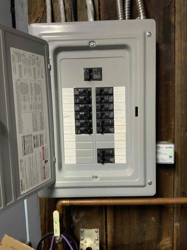 Conducted electrical estimate for new whole home generator installation at manufactured home. Assessed existing 200-amp electrical panel, available breaker capacity, and utility room infrastructure to determine feasibility and requirements for generator integration. Documented current electrical service configuration, panel accessibility, and optimal placement considerations for future generator equipment and automatic transfer switch installation.