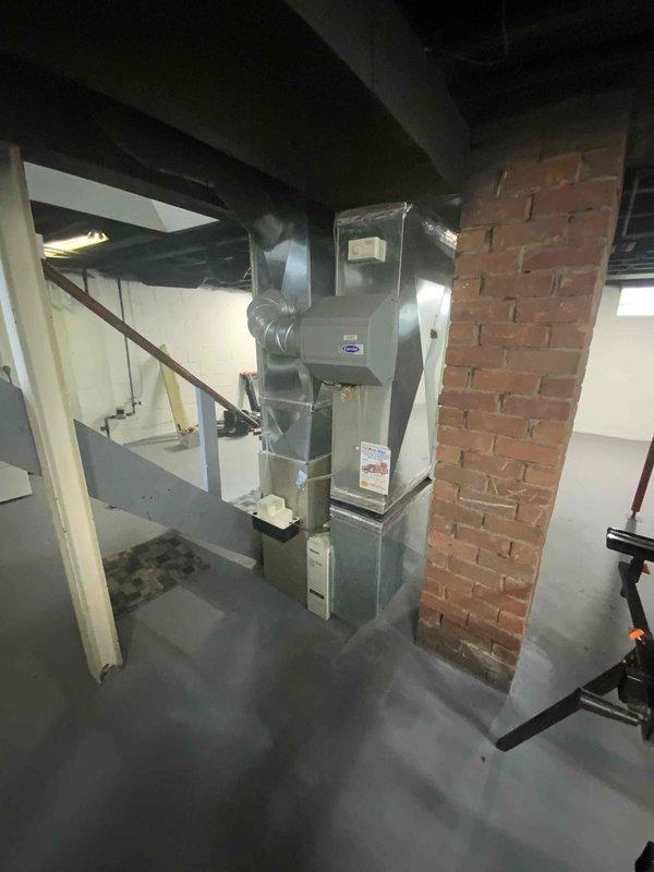 Completed full system estimate for 700 square foot property with existing 2004 furnace and ductwork in basement location. Assessed current 16-year-old furnace unit and evaluated existing silver metallic ductwork system for compatibility with new equipment installation. Provided pricing options for furnace replacement with central air conditioning addition, as well as alternative dual fuel heat pump system configuration to meet customer's timeline of replacement within one month.