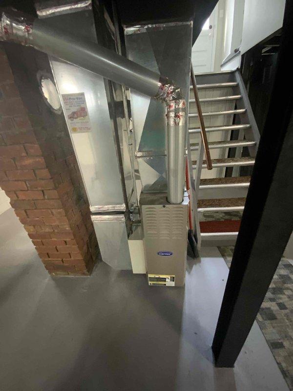 Completed full system estimate for 700 square foot property with existing 2004 furnace and ductwork in basement location. Assessed current 16-year-old furnace unit and evaluated existing silver metallic ductwork system for compatibility with new equipment installation. Provided pricing options for furnace replacement with central air conditioning addition, as well as alternative dual fuel heat pump system configuration to meet customer's timeline of replacement within one month.
