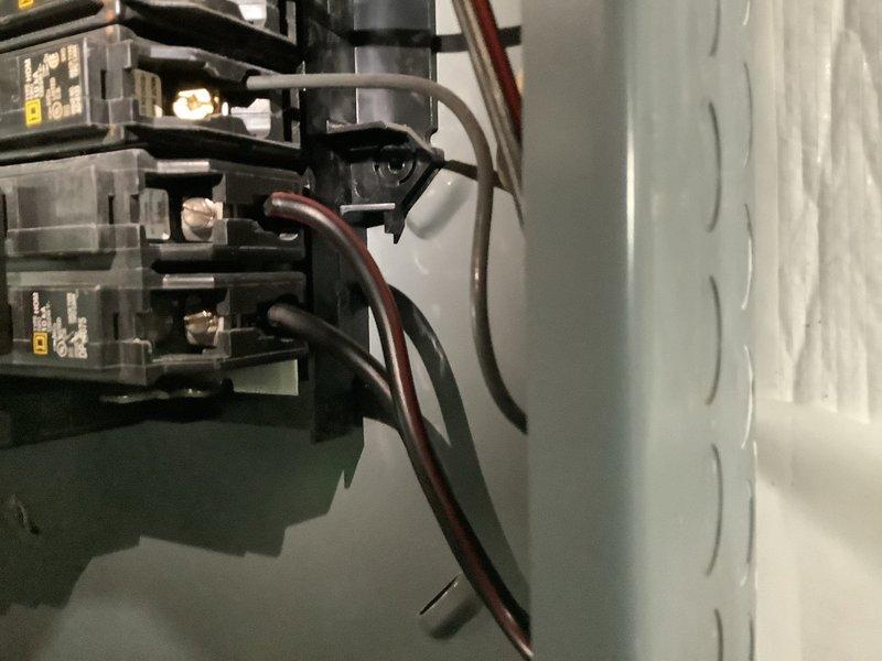 Responded to no cooling complaint on 4-year-old Goodman system with unit running continuously but failing to reduce indoor temperature from 78°F to setpoint of 74°F. Performed comprehensive system diagnostic including inspection of electrical panel, circuit breakers, and wiring connections to identify root cause of cooling failure. Documented electrical components and breaker configuration for further analysis and resolution of ongoing service issues at this location.