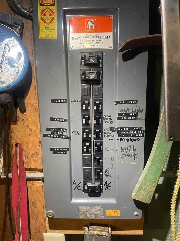 Provided comprehensive estimate for complete furnace and air conditioning system replacement in basement location. Existing 20+ year old R22 system operating poorly with suspected refrigerant leak. Current equipment includes natural gas furnace with extensive ductwork and electrical service panel showing dedicated circuits for HVAC equipment. Assessed existing infrastructure including insulated supply ductwork, electrical capacity, and mechanical room layout to determine replacement specifications and installation requirements.