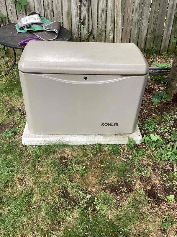 Completed routine preventive maintenance on a 3-year-old Kohler residential standby generator. Performed comprehensive inspection of all major components including engine, control panel, and exhaust system. Checked and verified proper oil level, inspected air filter, examined battery connections, and tested control panel functionality with digital display and illuminated indicators operating correctly. Verified generator mounting on concrete pad remained secure and stable. All safety labels and warning decals confirmed present and legible. Unit tested successfully with no faults detected. Generator remains in good operational condition with all systems functioning within manufacturer specifications.