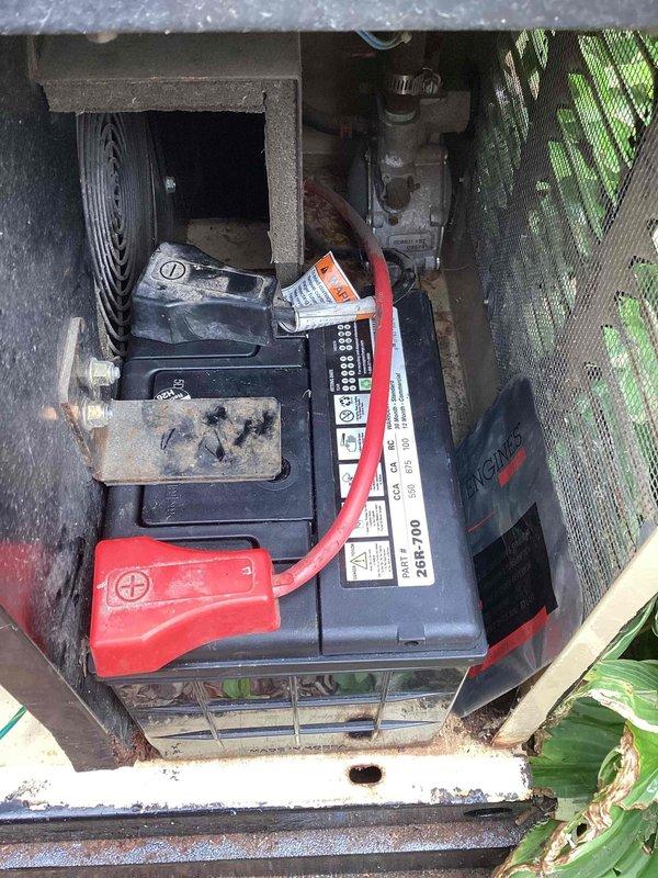 # Electrical Maintenance - Generator

Performed routine preventive maintenance on residential Generac standby generator. Conducted comprehensive system inspection including visual examination of all major components, electrical connections, and housing integrity. 

Inspected battery condition and terminals, noting proper voltage levels and secure cable connections with appropriate terminal protection in place. Evaluated blower assembly and air circulation components, observing dust and debris accumulation on blower wheel blades and housing surfaces consistent with normal outdoor installation exposure. Documented existing surface rust and discoloration on metal housing components typical of equipment age and environmental exposure.

Verified generator enclosure integrity and proper ventilation pathway clearance. Confirmed all mechanical components accessible and operational. Unit currently running without reported issues or operational concerns. Documented equipment condition through ph