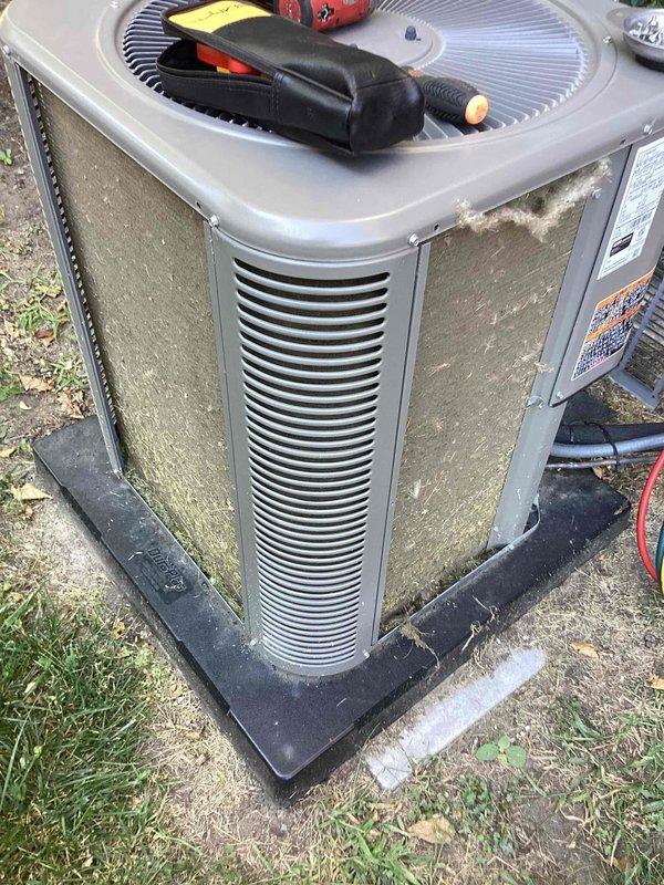 Completed scheduled Air Care Maintenance on residential air conditioning system. Performed comprehensive inspection of outdoor condenser unit, including cleaning of coils and removal of debris accumulation from louver sections. Verified proper operation of condenser fan, checked refrigerant levels, and confirmed unit functionality. System operating within normal parameters upon completion of preventive maintenance service.