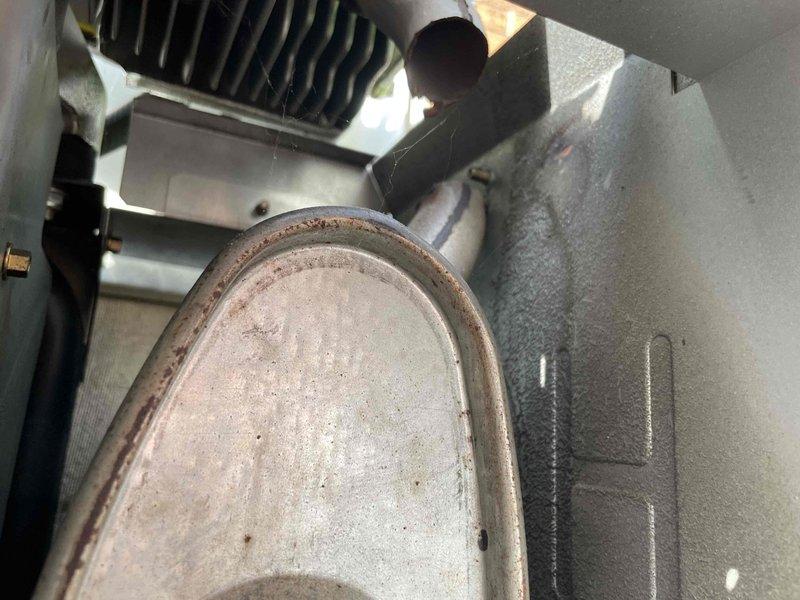 Responded to a Generac standby generator that failed to activate during a recent power outage. Unit had not received regular maintenance since homeowner acquired the property, with unknown service history and no records of kilowatt rating. Performed comprehensive diagnostic evaluation and preventive maintenance service to identify failure cause and restore automatic transfer functionality. Inspection revealed significant corrosion on mounting hardware and fasteners, along with heavy dust and debris accumulation throughout the unit's internal components, including the cooling system heat exchanger fins. Documented deteriorated conditions with photographic evidence showing oxidation on critical mechanical components and latch mechanisms. Addressed maintenance deficiencies and evaluated transfer switch operation to determine root cause of activation failure during utility power loss.