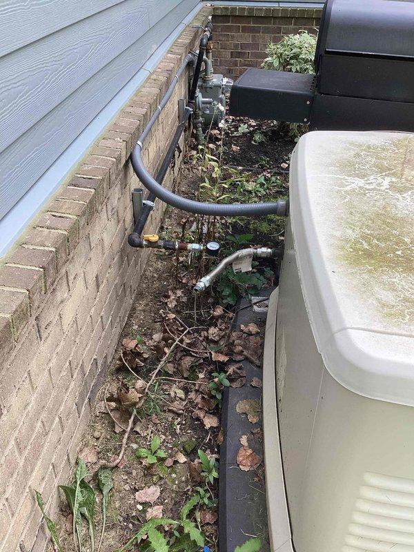 Performed routine preventive maintenance on residential Generac standby generator. Inspected unit serial number 3013525882, verified proper operation of all components including gas connections, control systems, and electrical connections. Cleared vegetation and debris from around unit perimeter and condensate pan area to ensure adequate airflow and prevent potential drainage issues. All systems tested and operating within normal parameters, no deficiencies noted.