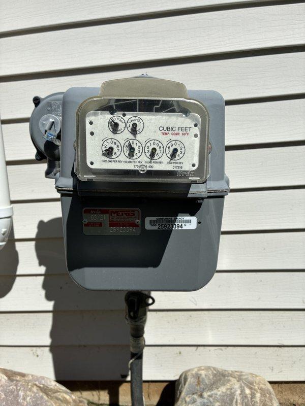 Conducted on-site evaluation for new whole home generator installation at manufactured home. Assessed existing natural gas meter and utility connections, documented basement mechanical room layout including water heater and furnace positioning to determine optimal generator placement and fuel source integration. Provided estimate for complete generator system installation with natural gas connection.