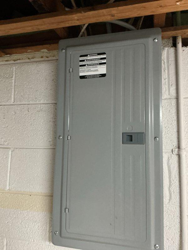 Successfully completed installation of 14kW Generac standby generator system at residential property. Generator unit mounted on concrete pad adjacent to building foundation with proper clearances maintained, electrical connections established through conduit run to interior transfer switch panel mounted on basement wall. All permit requirements fulfilled, system tested and operational.