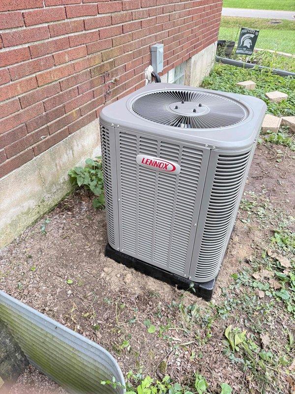 Completed full HVAC system installation including 70,000 BTU furnace with humidifier, 2-ton air conditioning unit with evaporator coil, and electrical reconnection. Installed Lennox condenser unit on exterior pad with refrigerant line set, mounted electrical disconnect box on brick exterior, and completed all mechanical connections. System tested and operational upon completion.