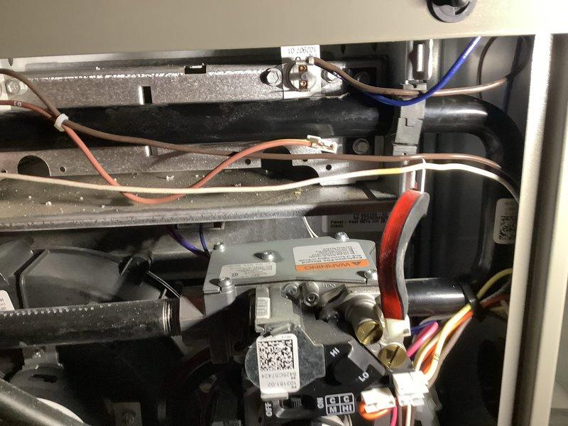 Responded to service call for 1-year-old furnace in basement displaying thermostat error code 200 with only blower fan operating. Upon inspection, identified heavily soiled air filter restricting airflow and causing pressure switch fault. Replaced dirty filter with new filter, verified proper system operation including ignition sequence, gas valve function, and blower motor performance. System restored to normal heating operation with error code cleared and all components functioning within manufacturer specifications under parts and labor warranty.