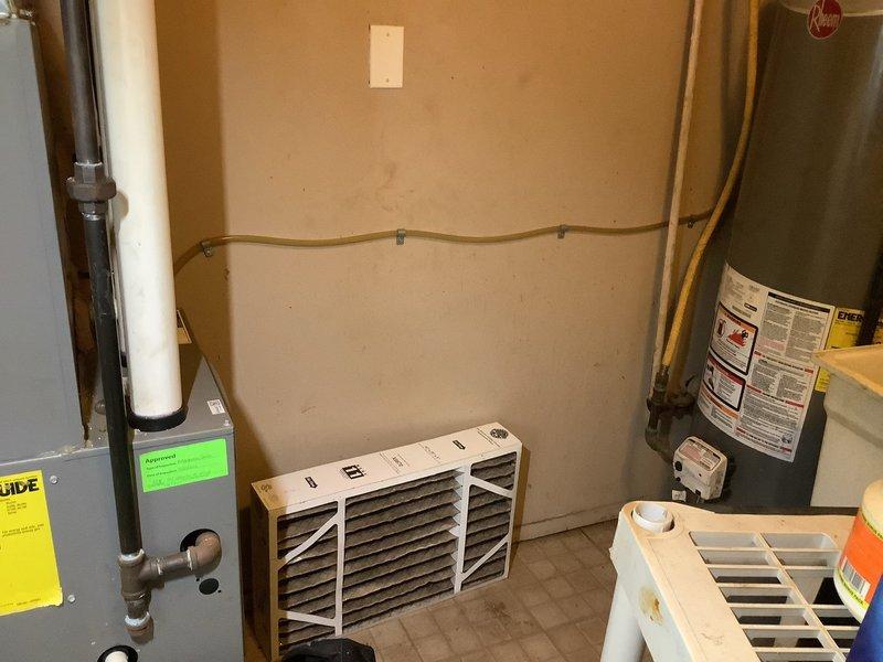Responded to service call for 4-year-old furnace system located in basement. Homeowner reported concerns about condensate pipe discoloration with yellow water present after attempting self-cleaning, and requested filter replacement. Upon arrival, inspected HVAC air handler unit and condensate drainage system. Replaced dirty air filter with new filter to restore proper airflow and system efficiency. Examined condensate piping and drainage components, addressing homeowner's concerns about discoloration. Performed visual inspection of furnace components, electrical connections, and associated mechanical systems. Verified proper operation of air handler unit and confirmed system functionality. All equipment operating within normal parameters upon completion of service.