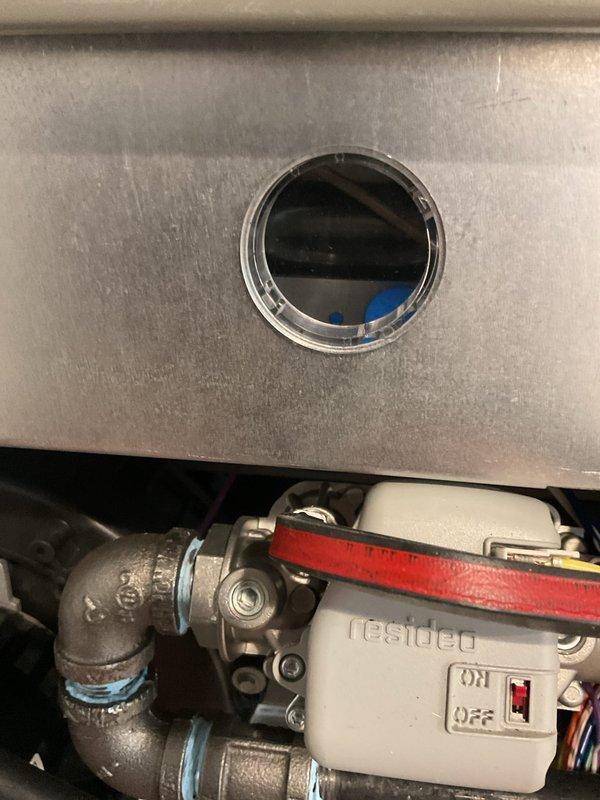 Completed scheduled maintenance on air handling unit. Replaced heavily soiled air filter that was completely clogged with dust and debris, restricting airflow to the system. Installed new evaporator pad and filter to restore proper ventilation and system efficiency.