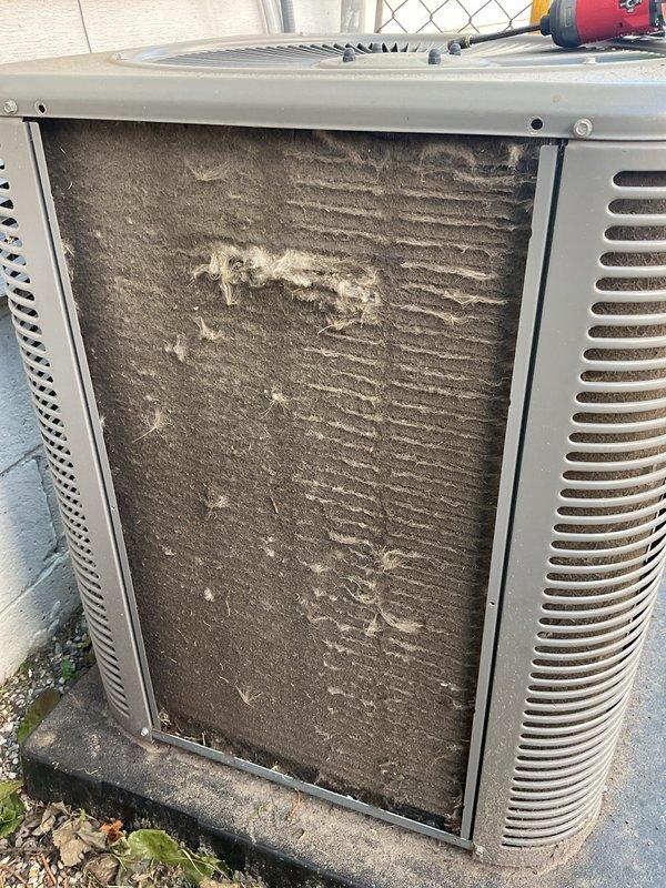 Completed scheduled maintenance on air handling unit. Replaced heavily soiled air filter that was completely clogged with dust and debris, restricting airflow to the system. Installed new evaporator pad and filter to restore proper ventilation and system efficiency.